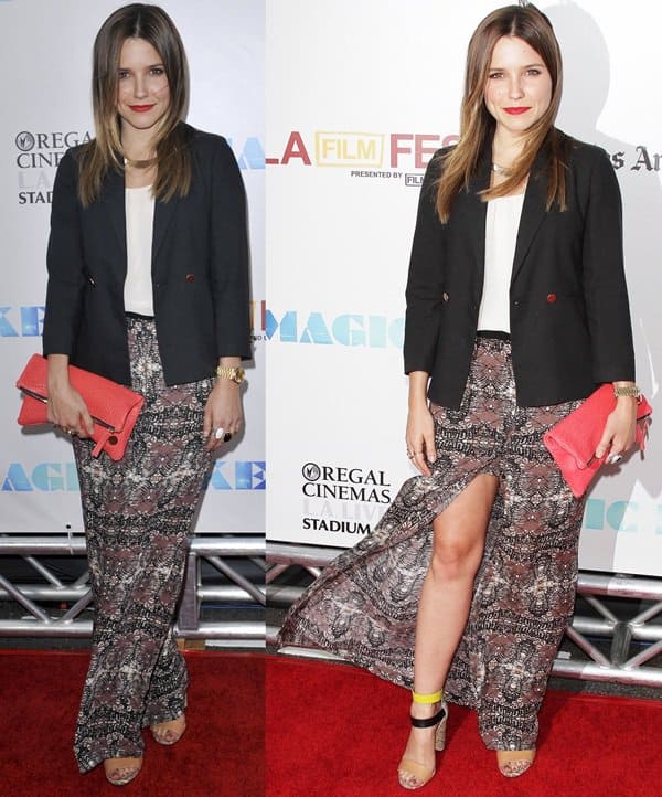 Sophia Bush paired an off-white top with an A.L.C. Batik-patterned maxi skirt and a Clare V. fold-over clutch
