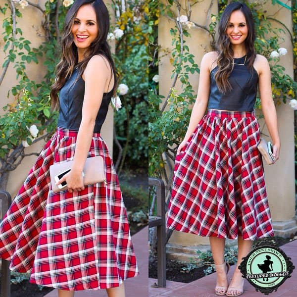 Melanee in a flirty plaid tea length skirt paired with a sexy racer front leather crop top